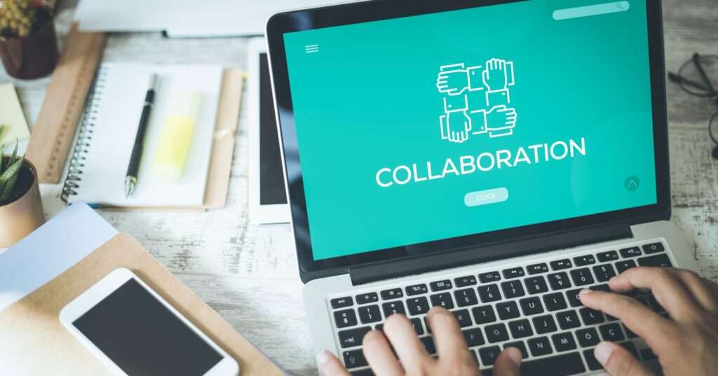 collaboration shown at laptop screen for devOps as a service companies